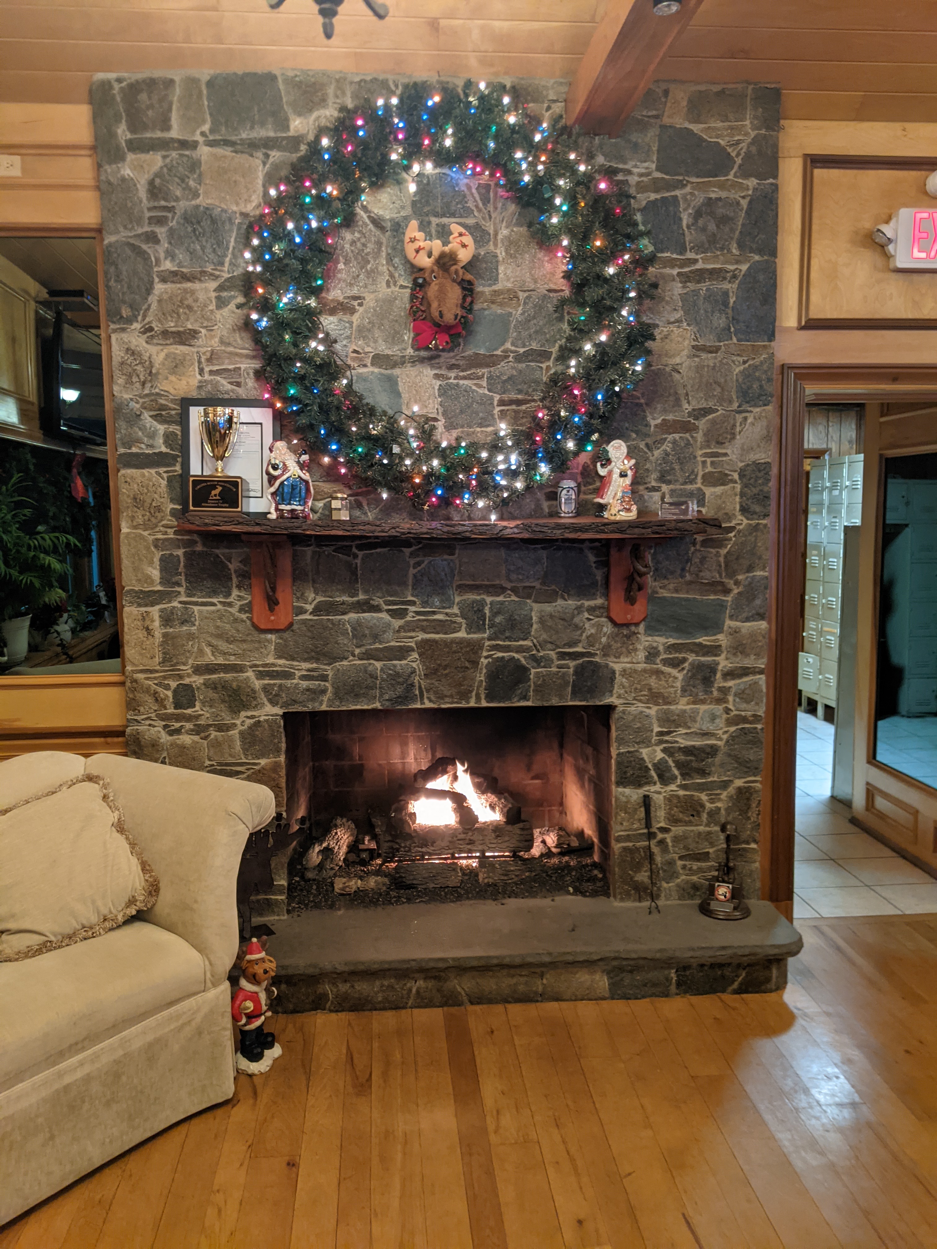 Cozy stone fireplace inside the lodge